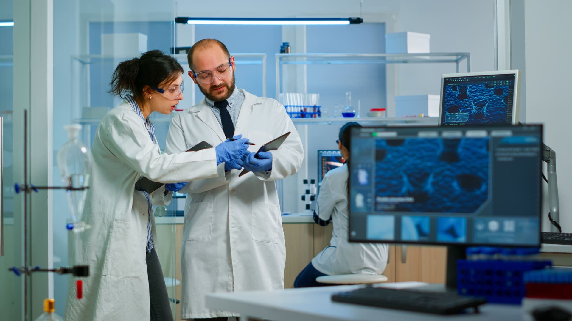 Antique Healthcare scientists reviewing R&D data in the laboratory